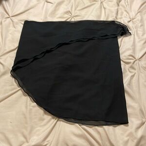 Black and white swim bottom cover up/skirt/wrap. Size small. Never worn.